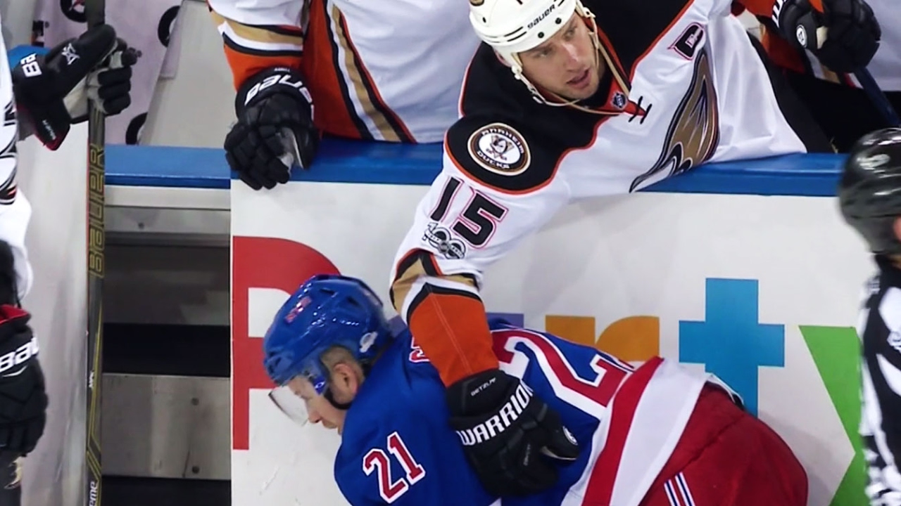 Getzlaf helps out Stepan after Shaw's hit from behind