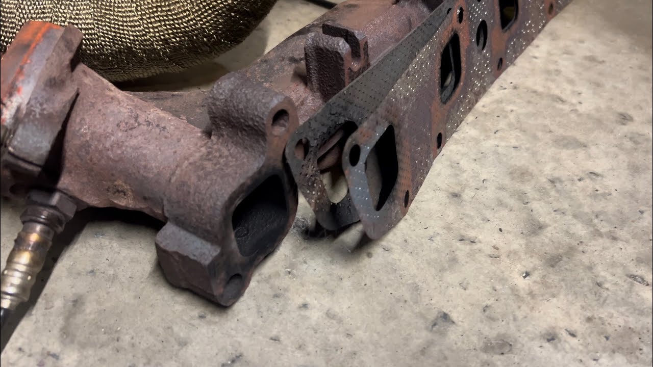 How to fix a Warped 5.7 Hemi Exhaust manifold and replace the gasket on Dodge Charger Chrysler 300