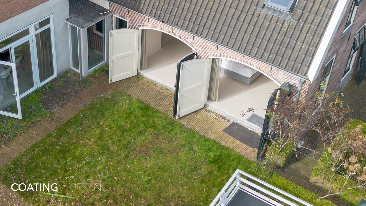 Lavasteen gietvloer in luxe woning | Stijlvolle naadloze vloer door Coatingvloer.nl