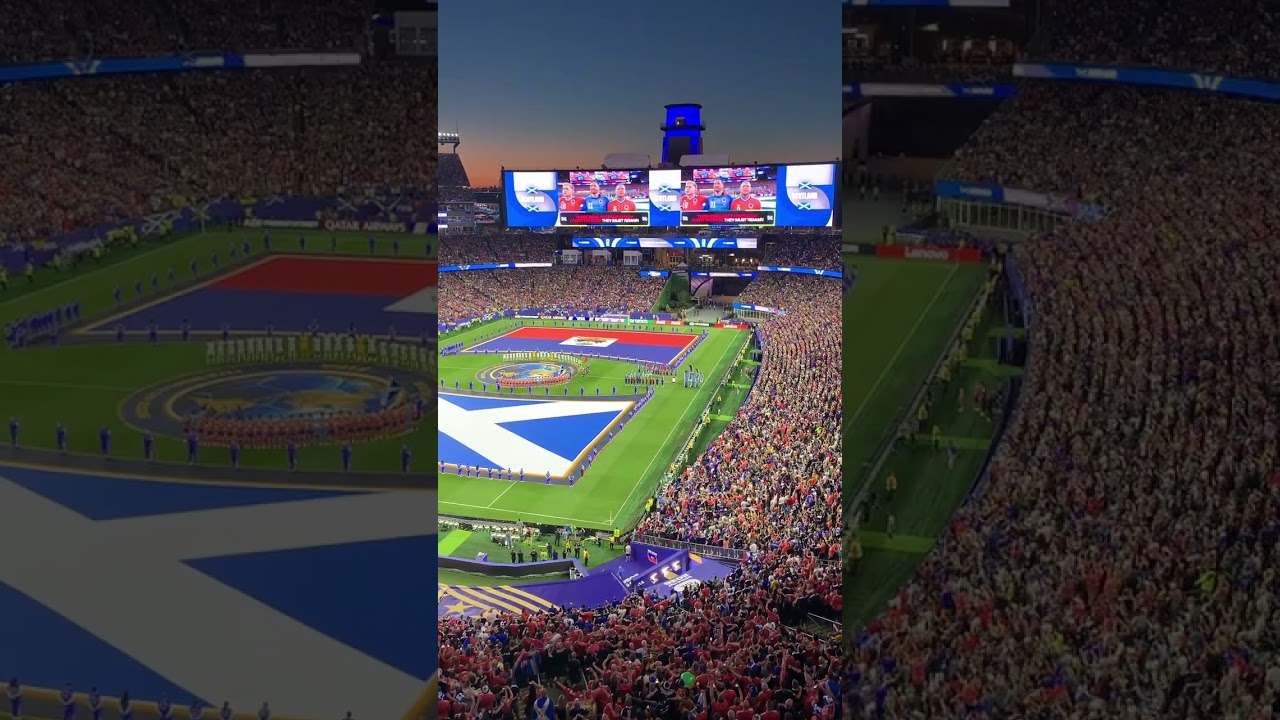 Fans sing the Scottish national anthem during the World Cup at Gillette Stadium
