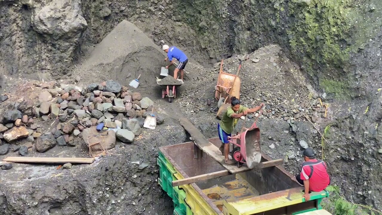 Sand mining activities load sand 