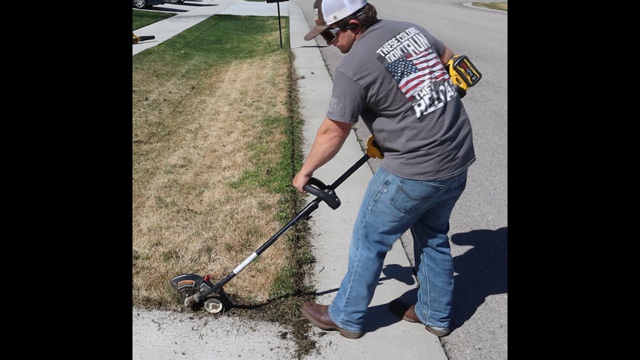Dewalt DCST972 60v attachment string trimmer in action. Edging my neighbors very over grown sidewalk
