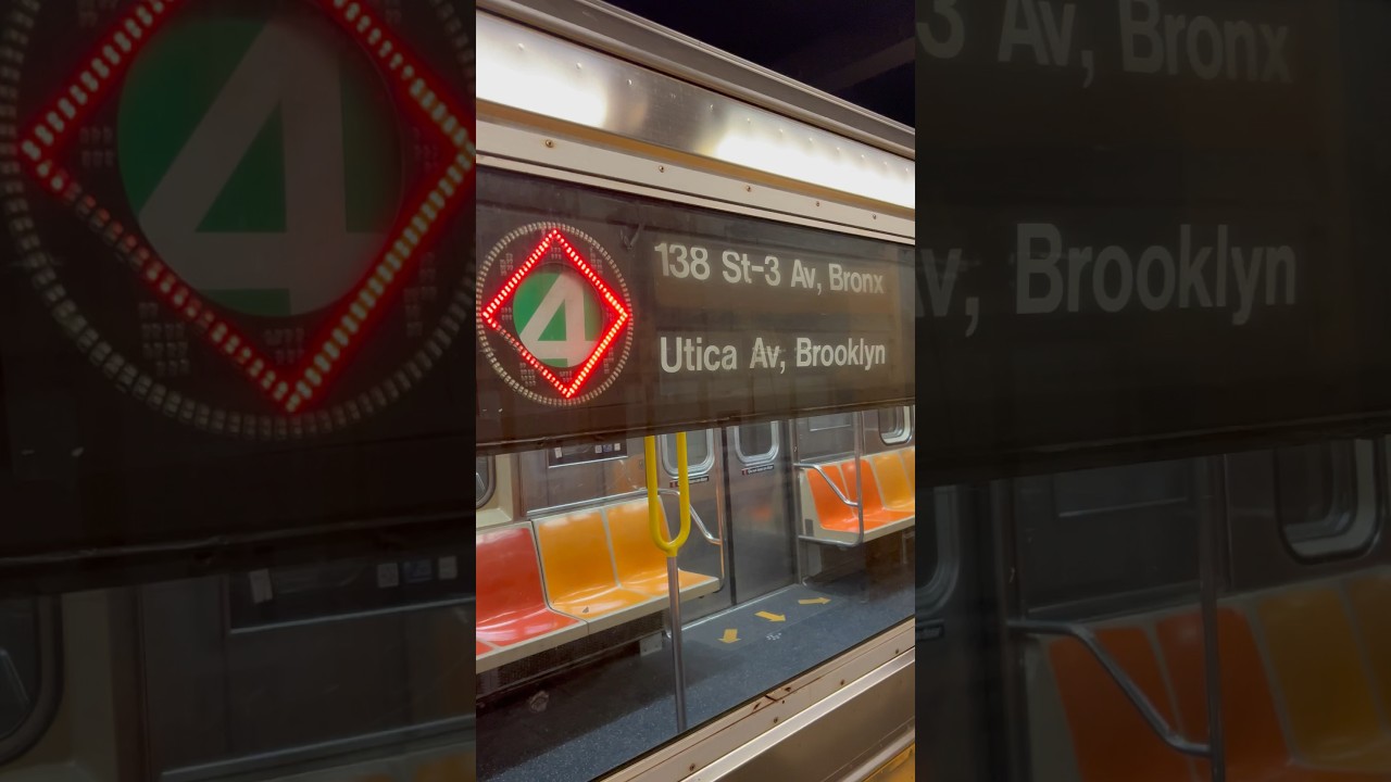 MTA subway: R62 {4} Express Train Entering Utica Avenue