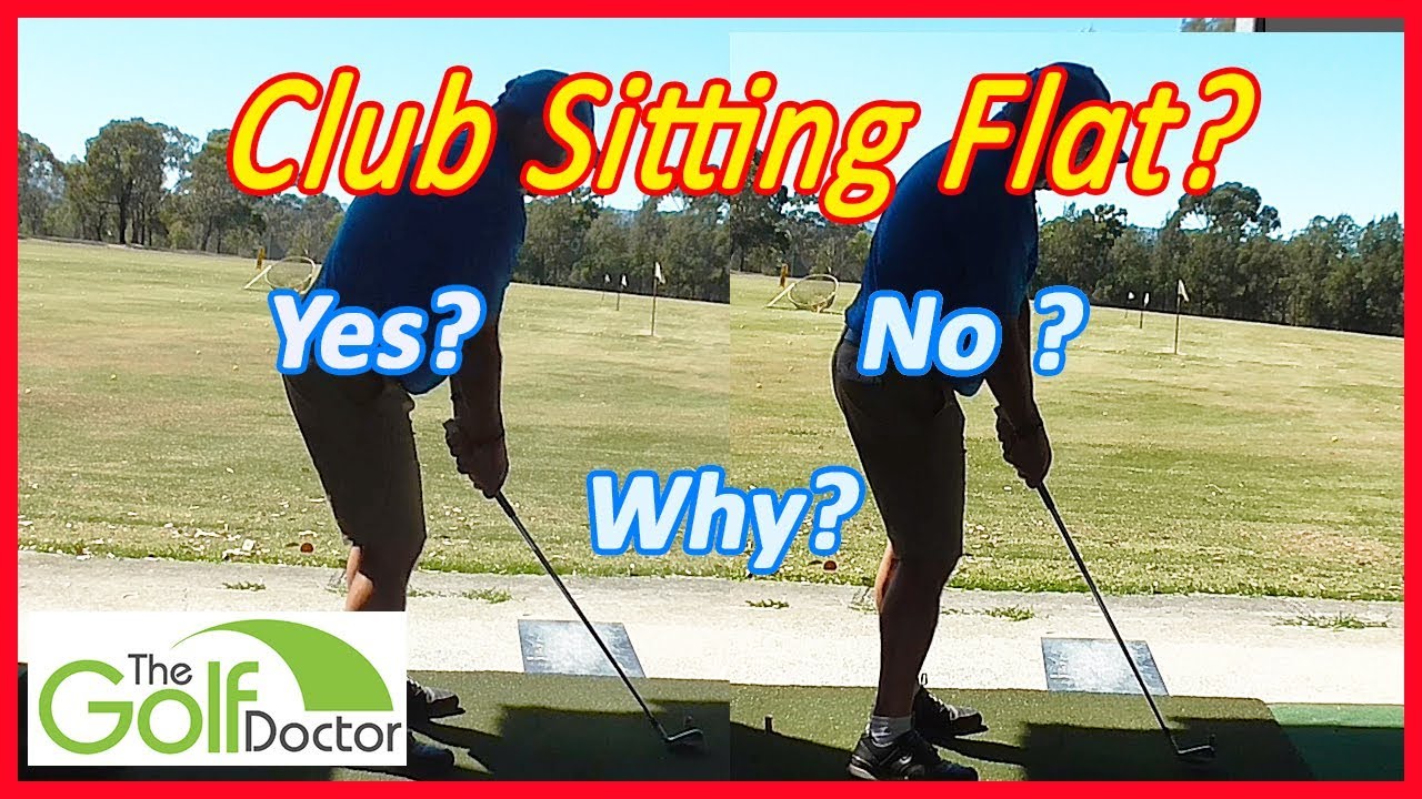 Should my irons sit flat on the ground at address in golf