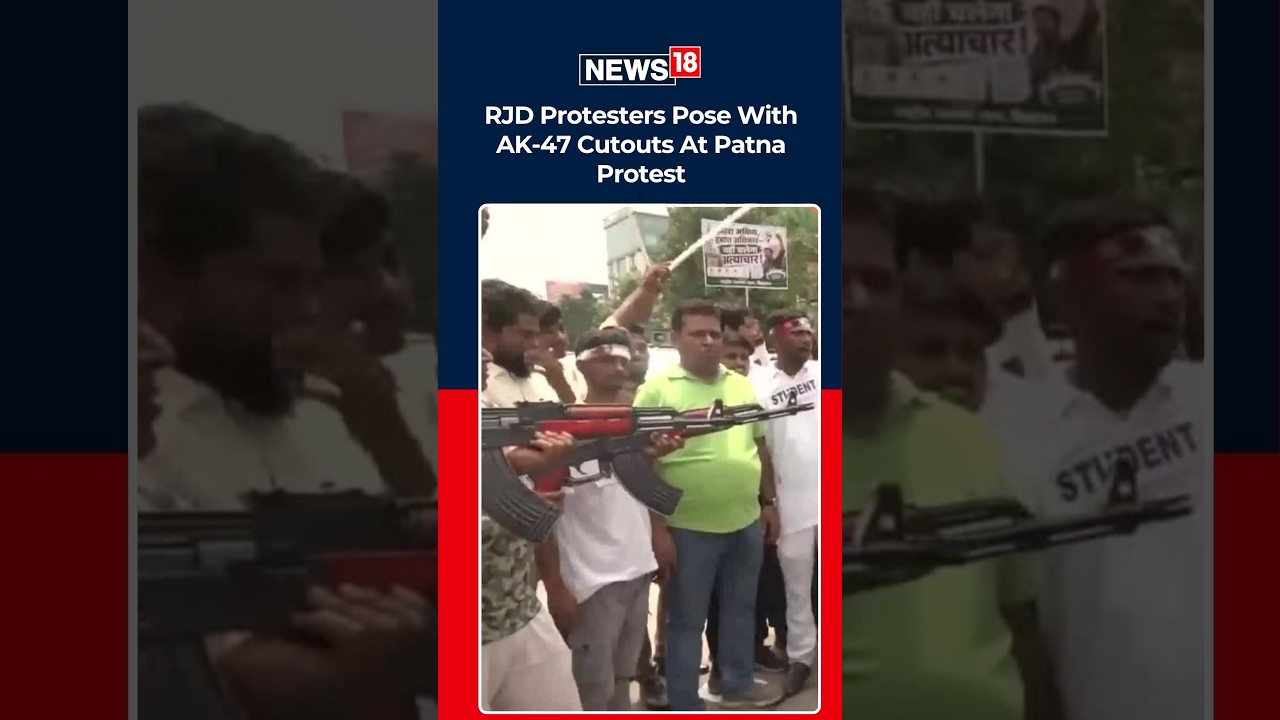 RJD Protest In Patna: Demonstrators Pose As Cops With AK-47 Cutouts Pointed At Students | N18S