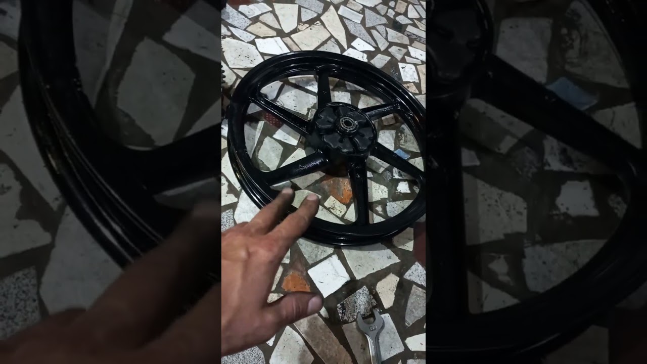 Adaptação rodas de cg 150 mix na cbx 200 strada! usando o eixo original da strada..