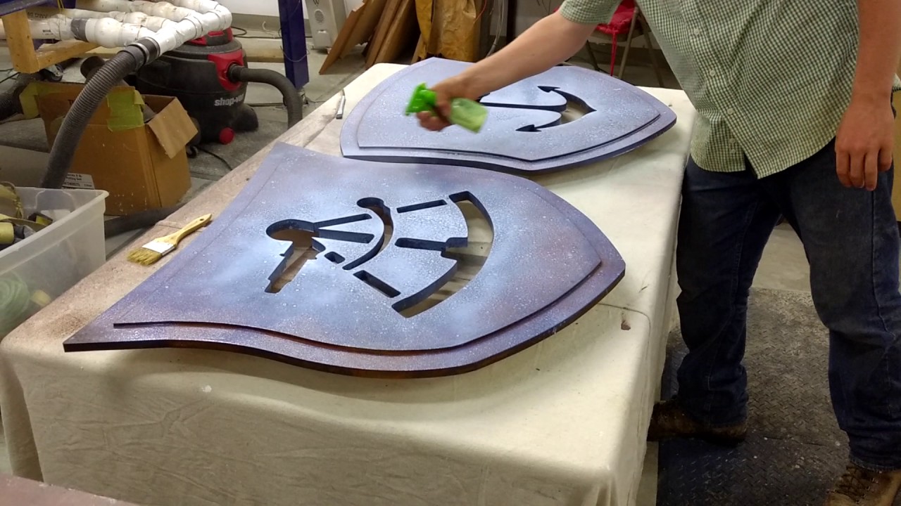 Applying the clear coat sealer over the rust.