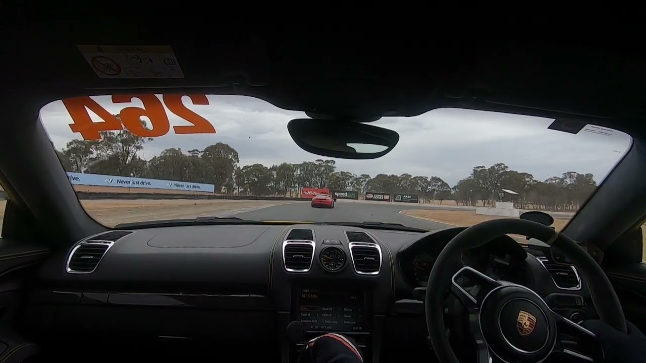 981 GT4 trying to hang with a GT4RS at Winton
