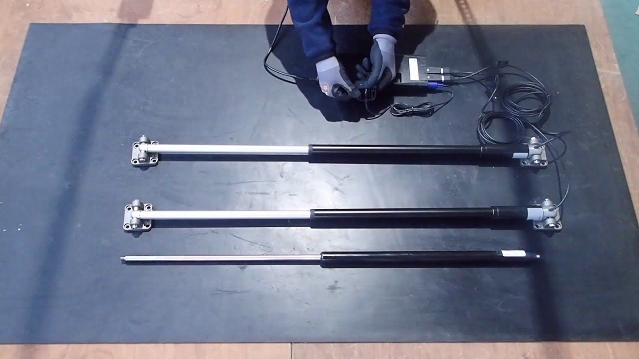 Electric cylinders to open and close a hatch or lid