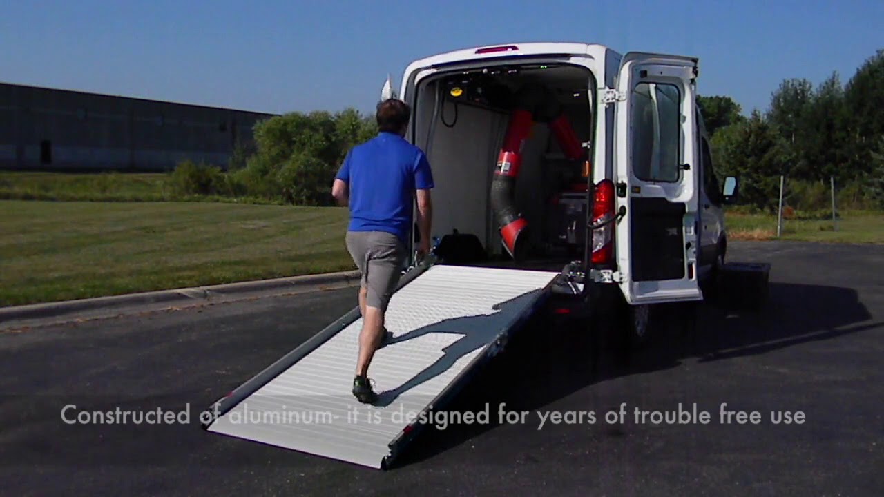 Efficient loading ramp in Ford Transit medium roof cargo van. Quickly load/unload nearly anything!!
