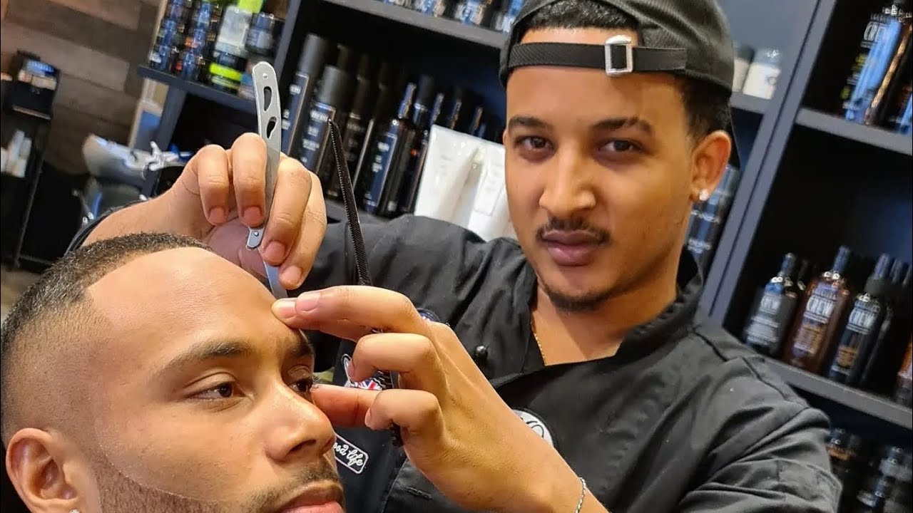 Eritrean barber (mid drop fade)