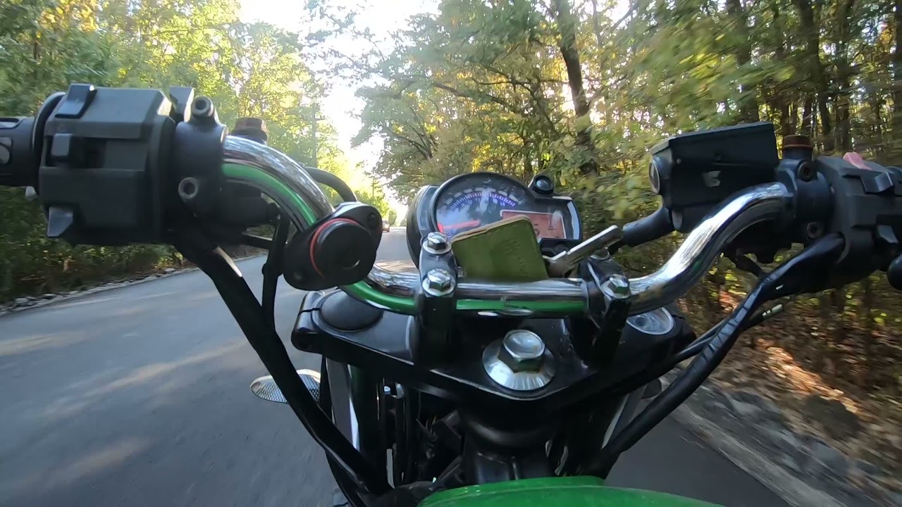 Autum motorcycle ride in a Romanian forest