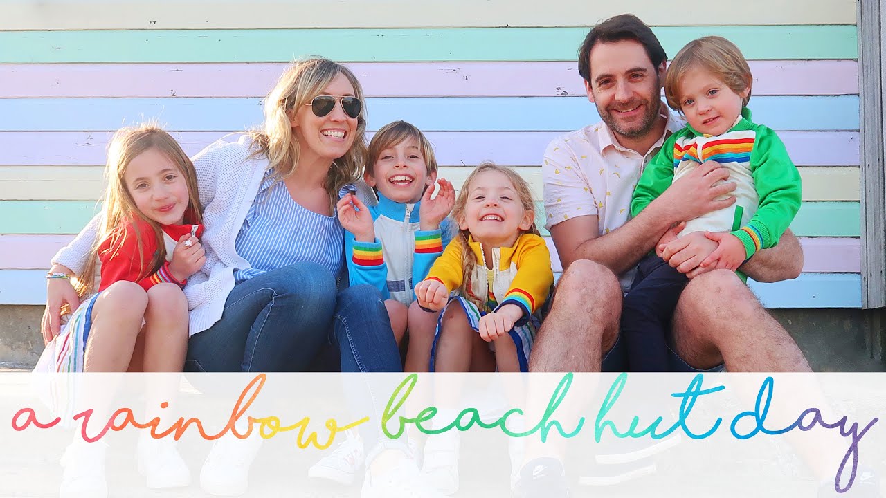 A RAINBOW BEACH HUT DAY