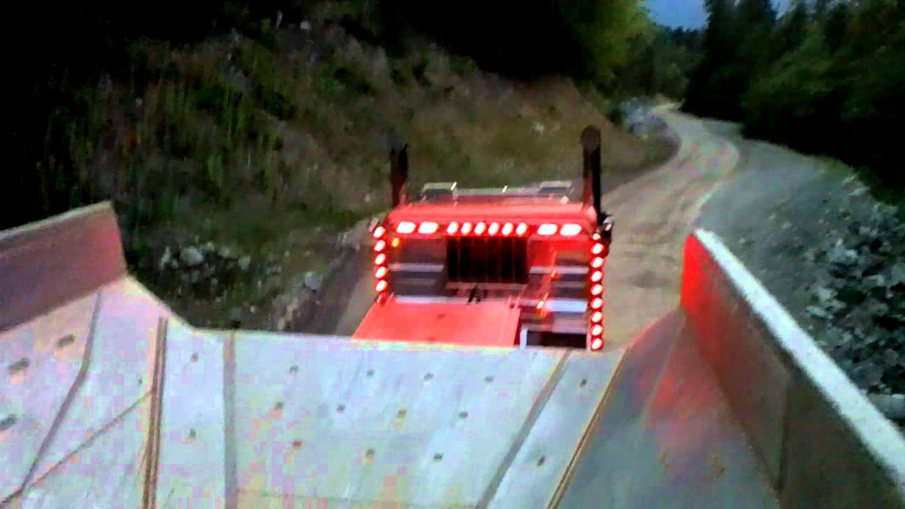 Rocktruck on lowbed Near boston Bar, B.C.