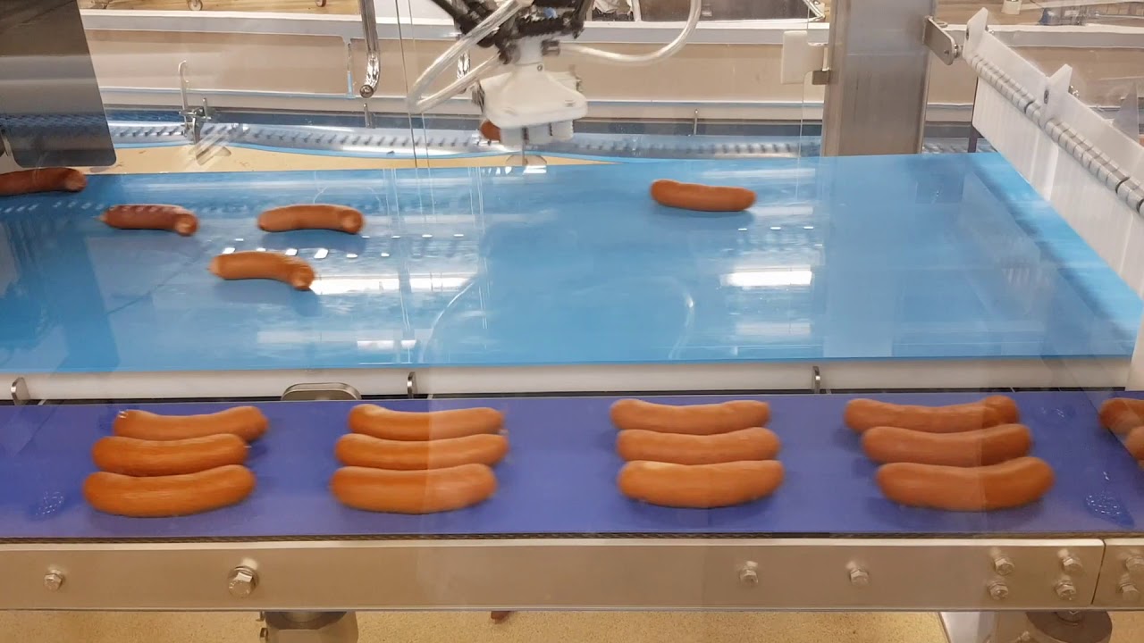 Robotcelle for pølsepakking levert av Dynatec