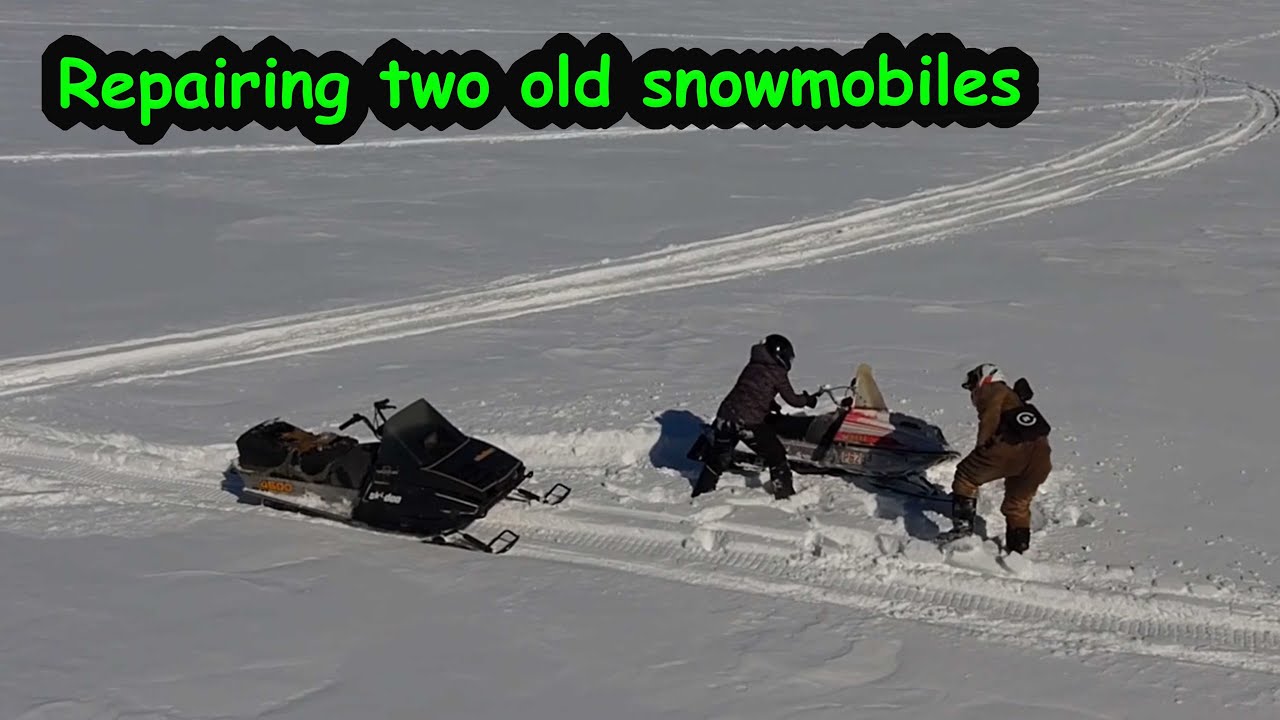 Fixing old snowmobiles and taking them for a ride.