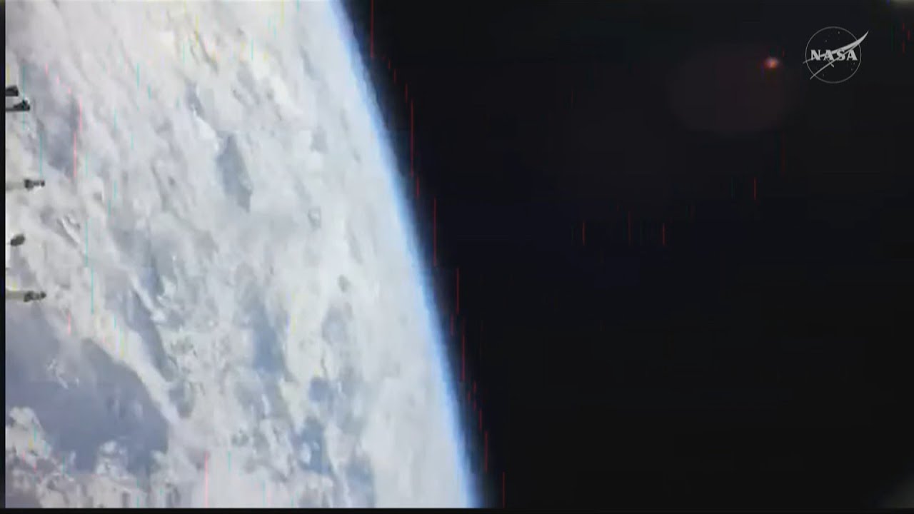 Artemis astronauts begin burn to blast out of Earth's orbit towards Moon | AFP