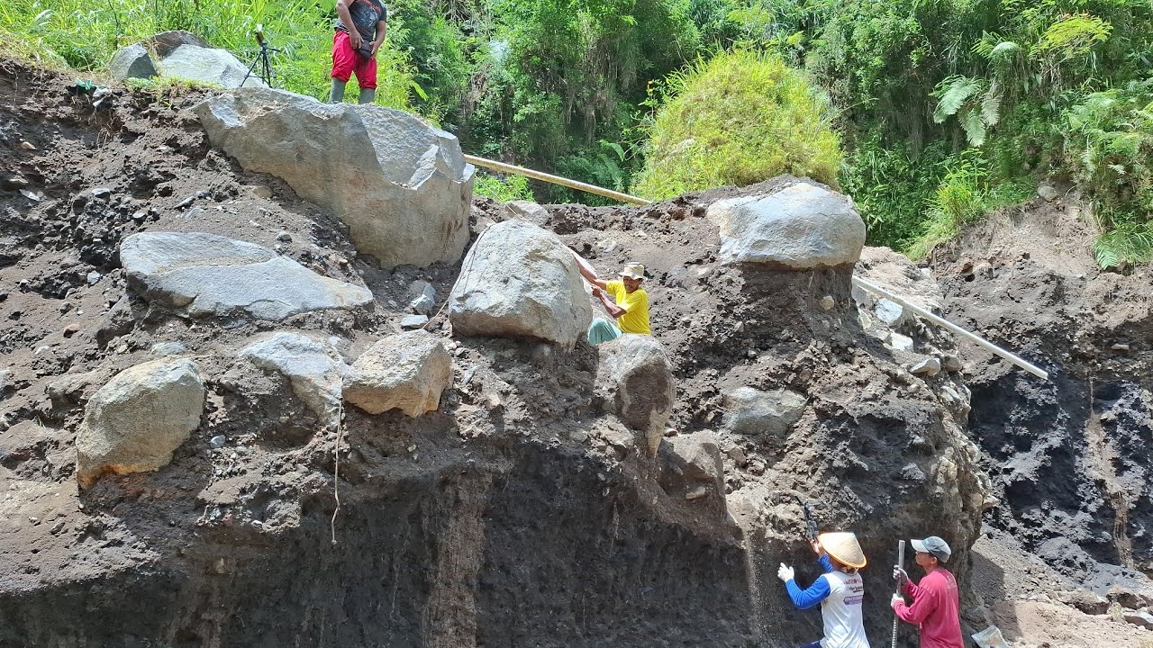 Breaking mountain rocks