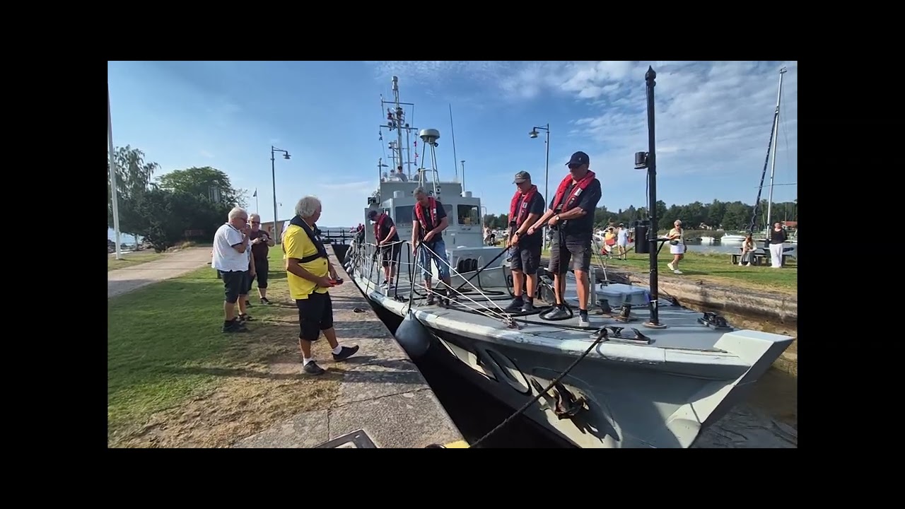 The Minesweeper M20, built 1941, arrives at the first locks of Göta Kanal, Sjötorp, Sweden 2024.