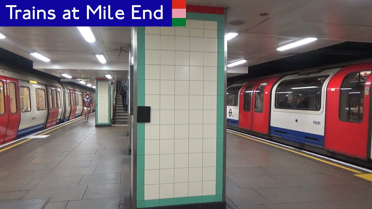 London Underground: Central, H&C and District line trains at Mile End