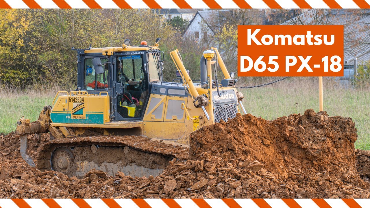 Komatsu D65 PX-18 bulldozer from Karp Kneip pushing dirt