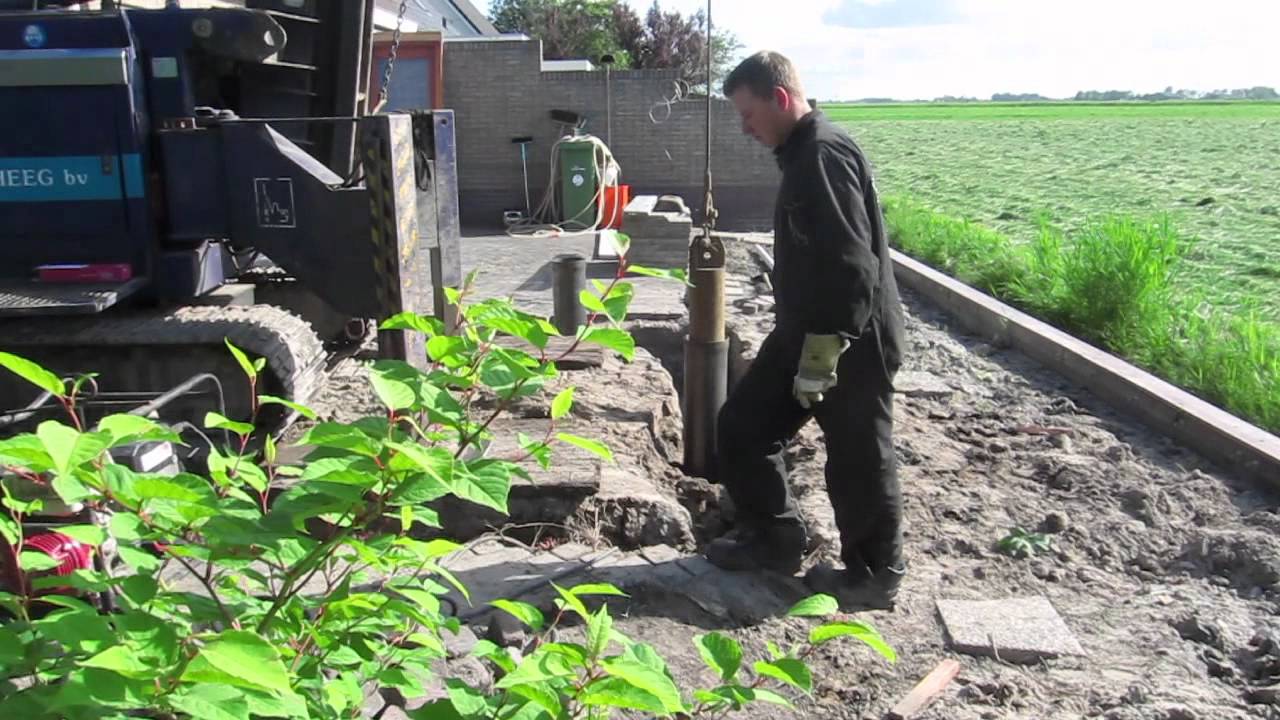 Heipalen met beton,