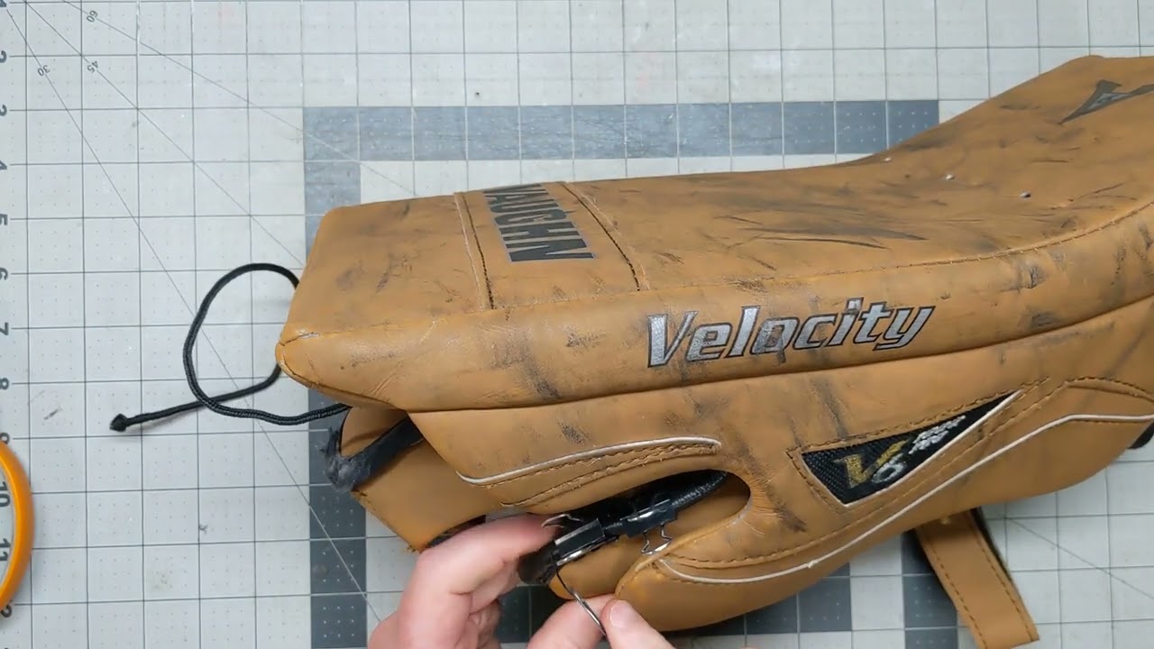 How to Use a Sewing Awl - Patching the Worn Thumb Binding on a Blocker