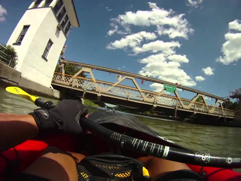 Slipping under a low bridge on the Erie Canal in a kayak