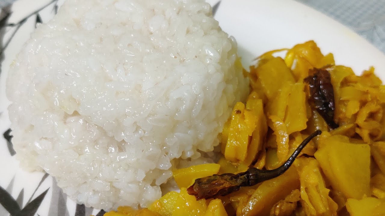 A meal with Sticky Rice & Potato Bambooshoot Sabji/ Bora Saul aru Alu-Khorisa Bhaji/Assamese cuisine
