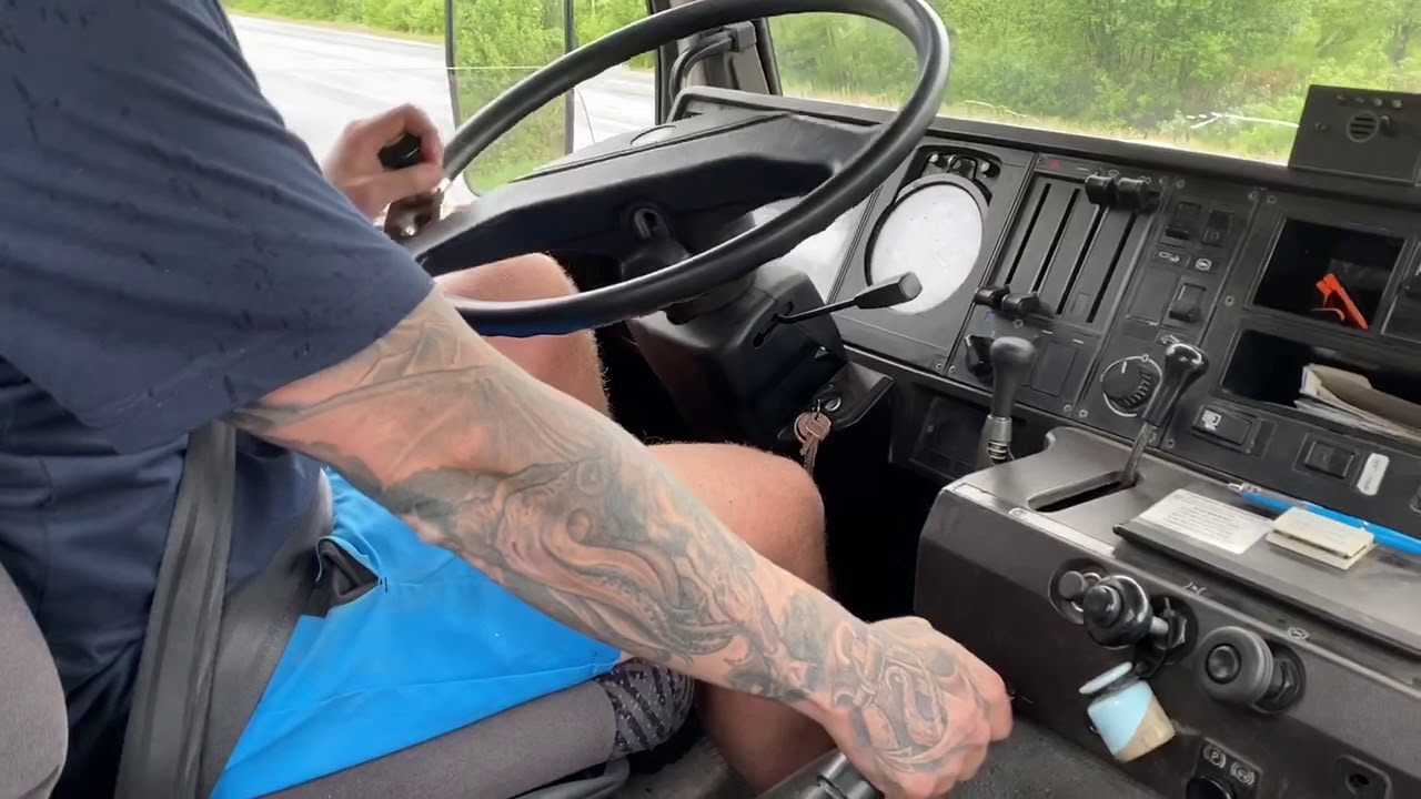 Scania P92M shifting gears uphill full load from the quarry
