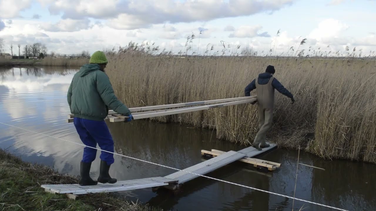 Building a hill from sludge (1) Using a bucket or a vacuum