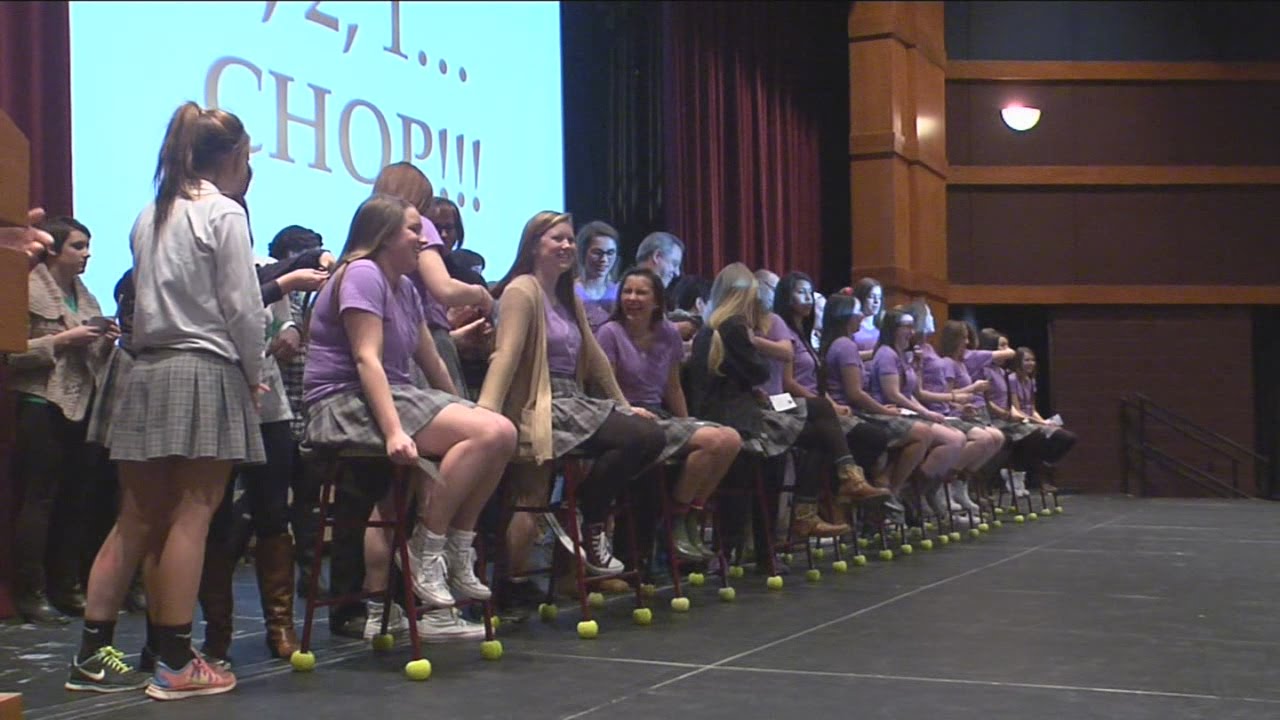 More than 150 girls from Divine Savior Holy Angels High School donate their hair to charity