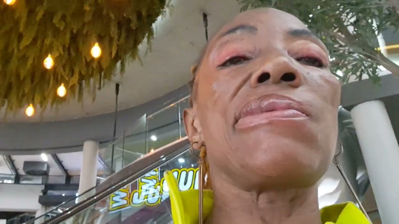Fashion lady is at Harvest mall with iron lady 