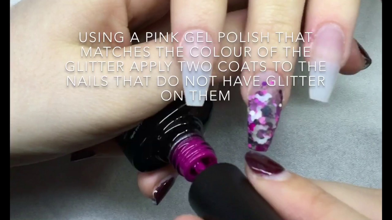 Pink glitter evil eye Halloween nails