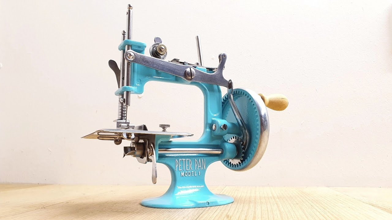 RESTORATION 1940S PETER PAN MODEL 1 SEWING MACHINE.