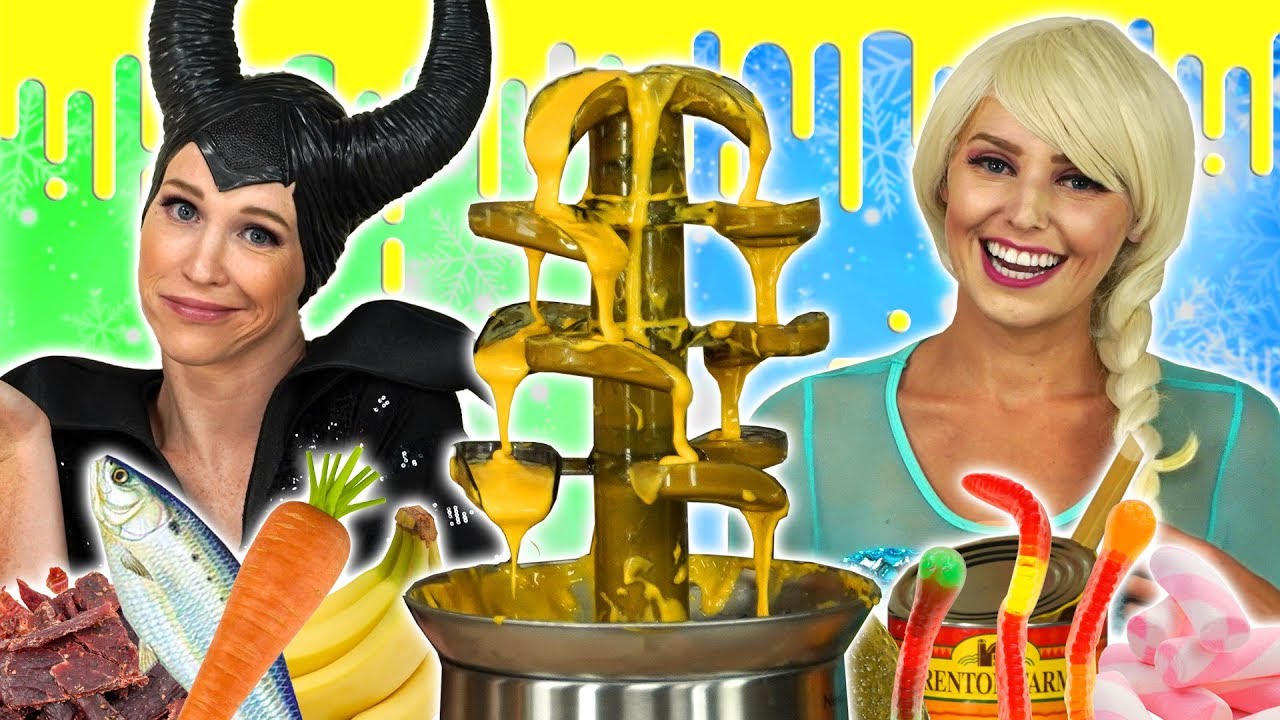 MALEFICENT VS ICE QUEEN FONDUE CHALLENGE. (What Food do they have to Eat?) Totally TV Challenge