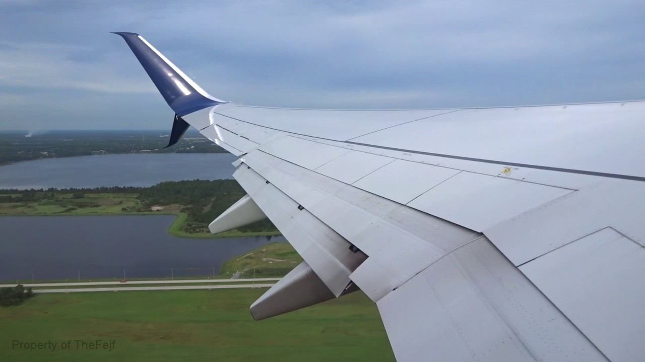 Delta Boeing 737-900ER - Gray Afternoon Takeoff Orlando with Rainbow Wings