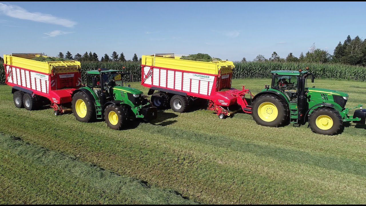 Bürli Trocknungsanlage mit John Deere und Pöttinger Power bei der Grasernte