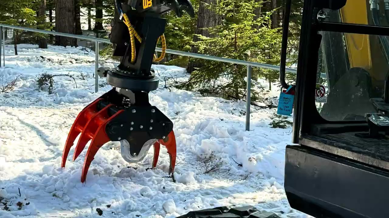 KX280 rotating grapple tree shear on a Sany SY60C excavator. 