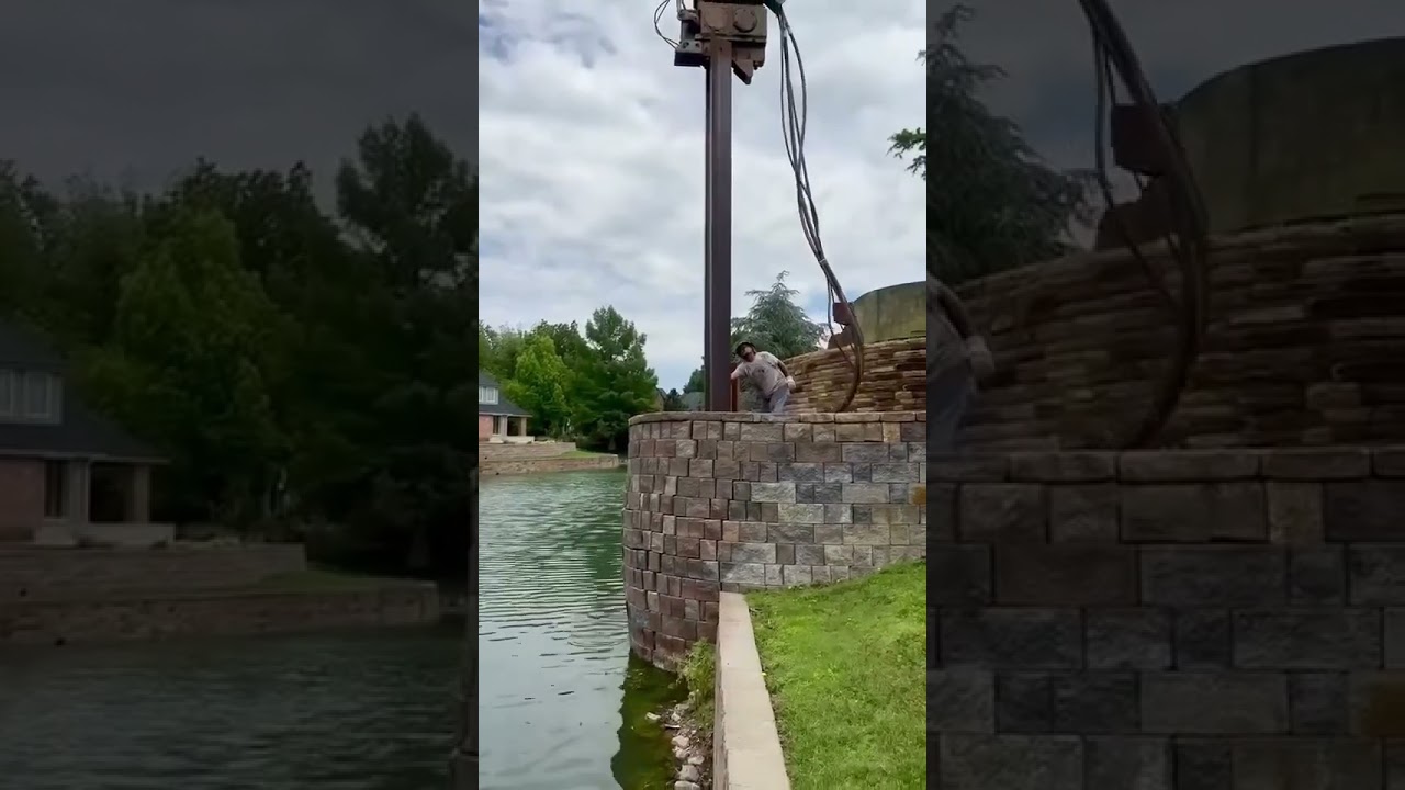 Vibratory hammer demolition of a failing retaining wall