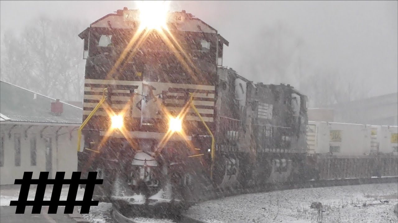 NS Trains in Snow Storm at Tyrone Train Station in PA with Silent Railroad Crossing at PT 222