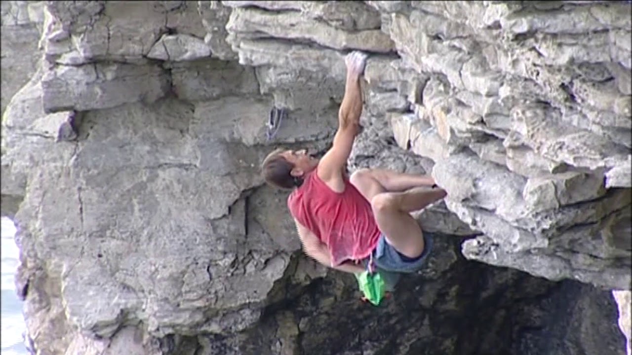 A deep water solo ascent of Worn-out Superman (7b), Ogmore, South Wales by Martin Crocker