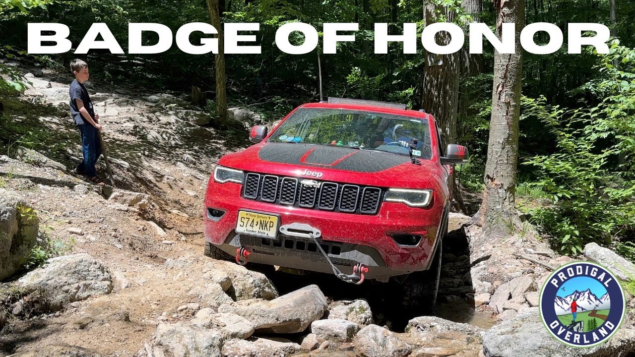 Grand Cherokee Off Road | Повреждения и значки на трассе