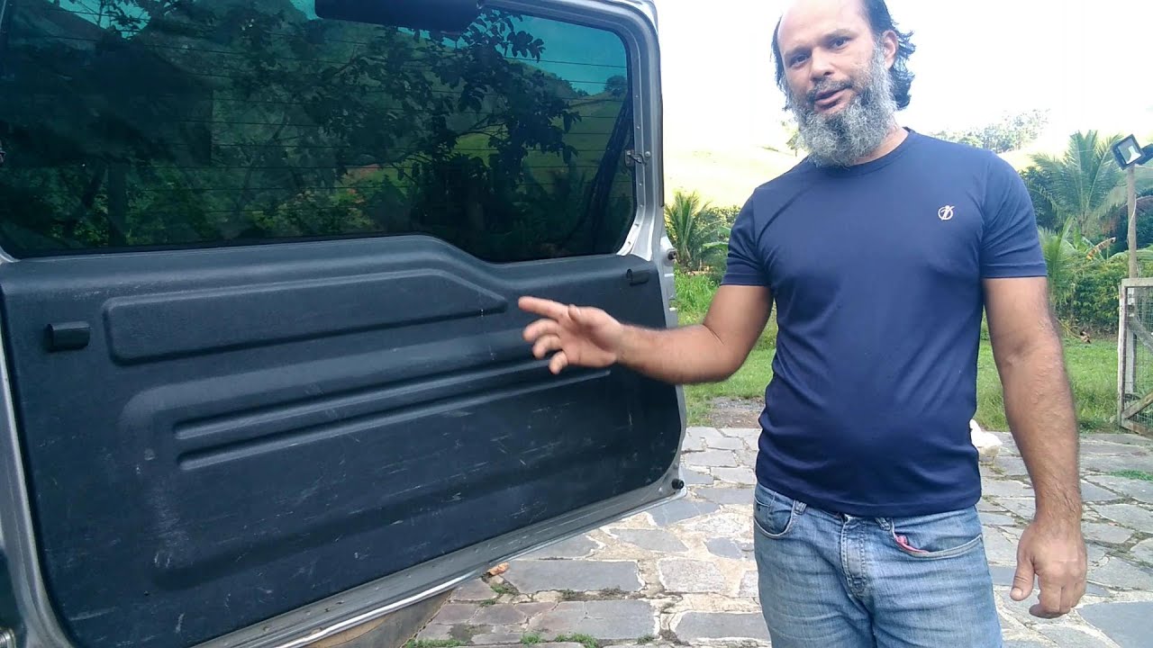 Pajero TR4 - Desmontagem e montagem do forro da porta  do porta malas