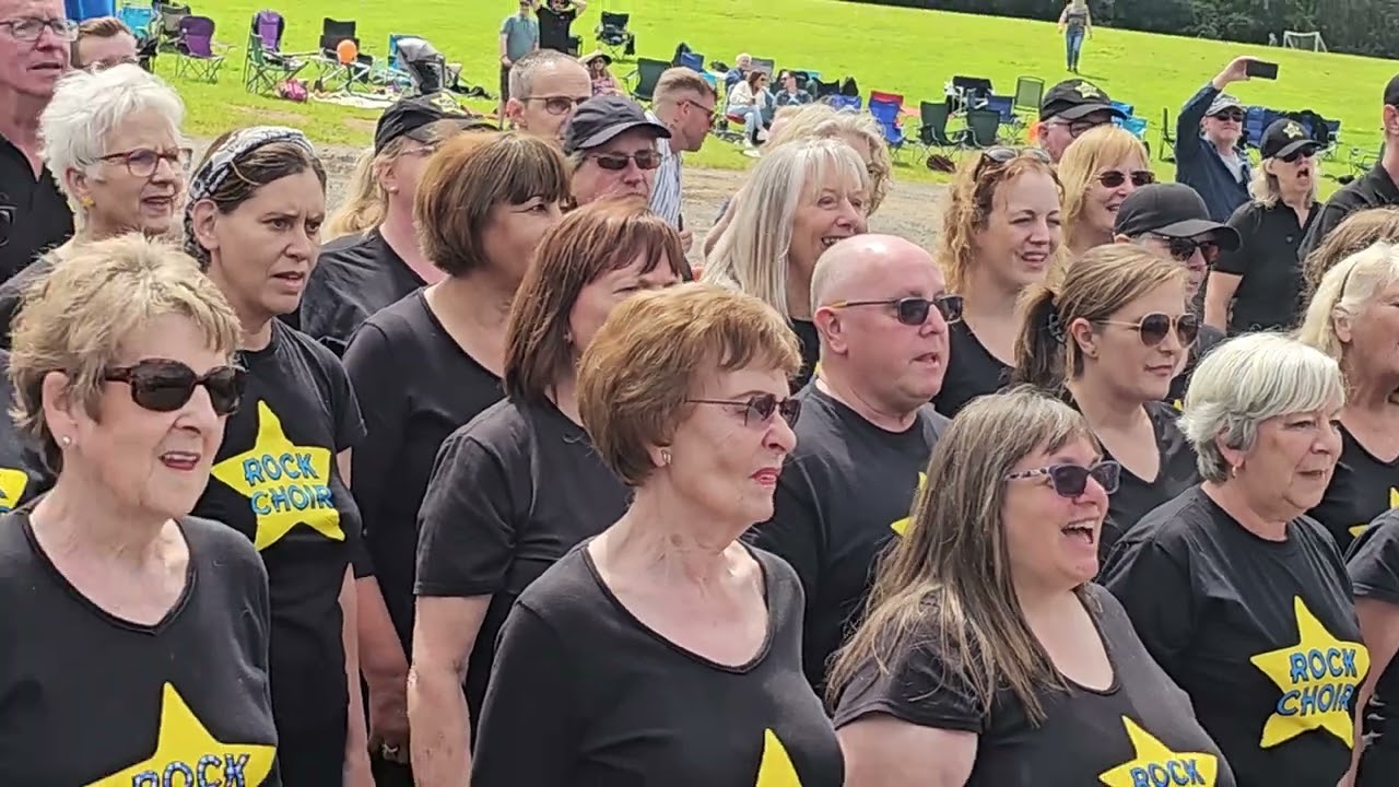 CORRIE STREET STARS singing DON'T STOP ME NOW with ROCK CHOIR at MND BBQ at Macclesfield RFC today