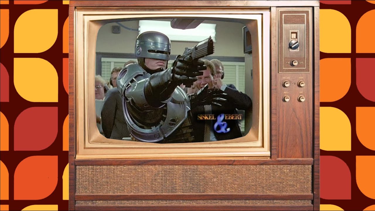 Siskel & Ebert Review - RoboCop, The Squeeze, Snow White, Withnail and I
