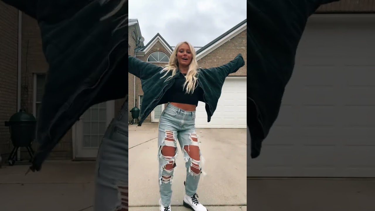 Blonde Woman Dancing in Ripped Jeans#dance #blonde #rippedjeans #fashion