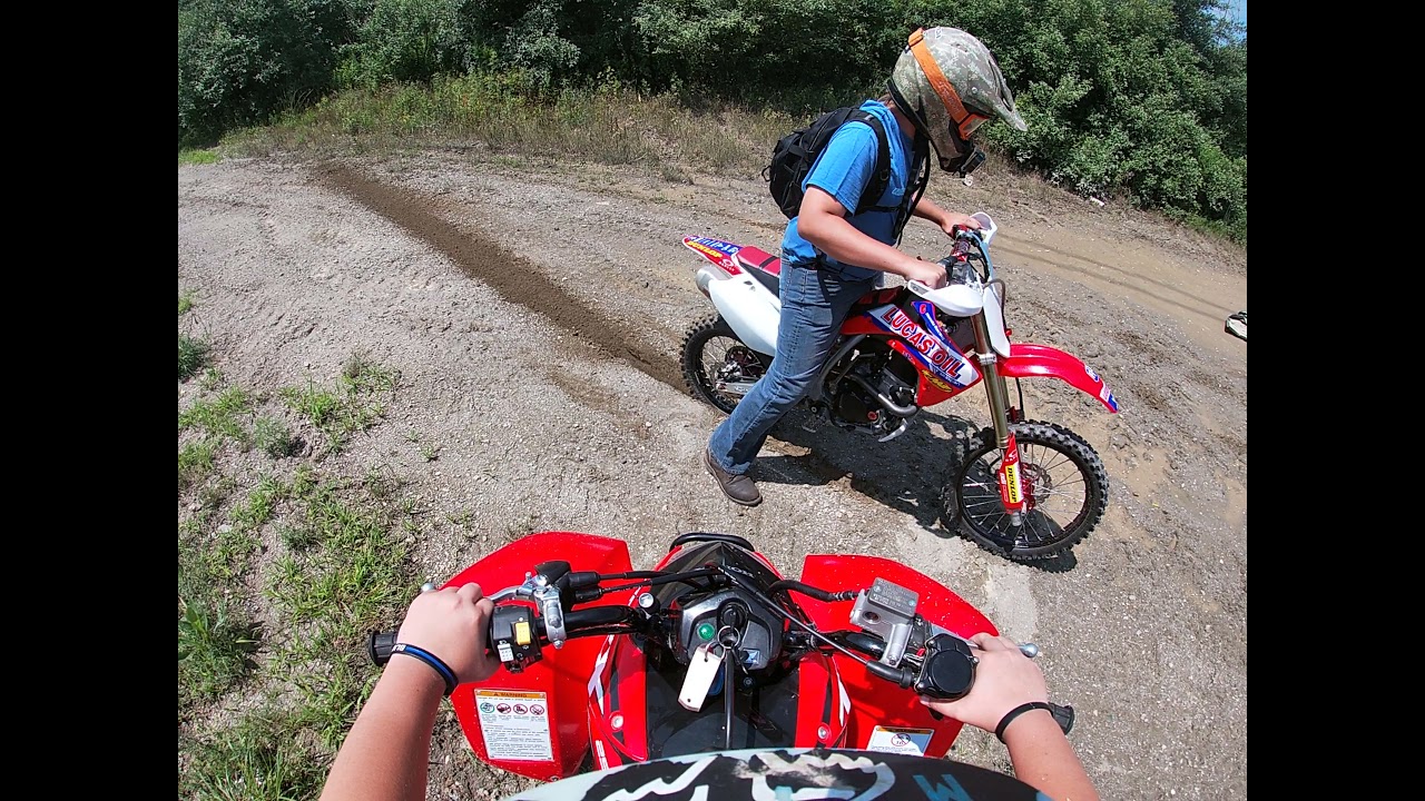 2021 TRX250X gets STUCK in THICK mud in the trails.