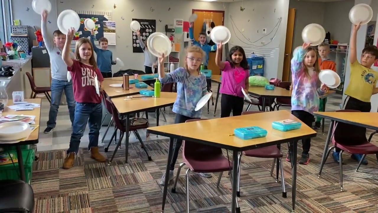 Summit Schools second graders music class plate dance