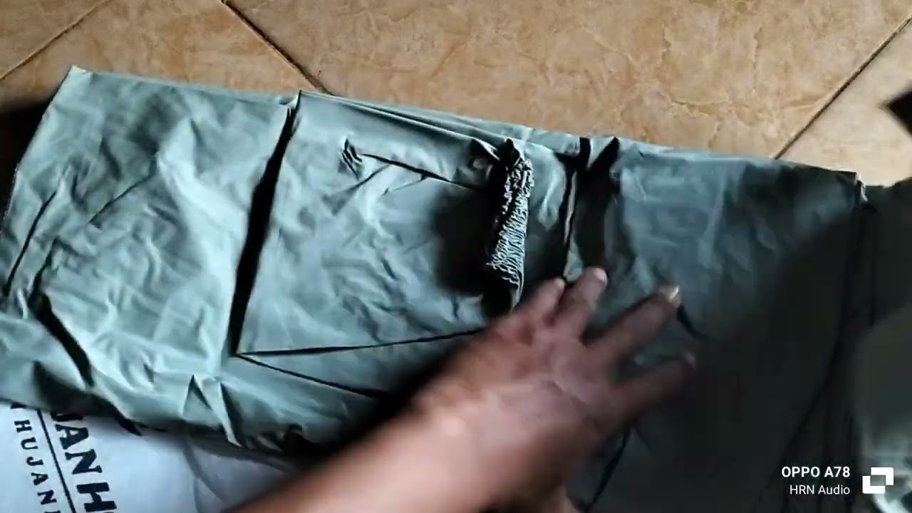 Unboxing jas hujan dari Jas Hujan HCS